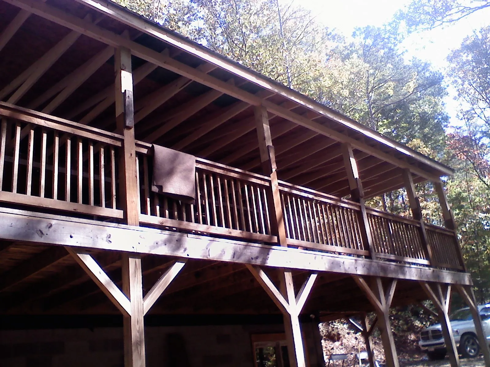 Timber framing under a new elevated porch and deck — Roof Leak Repair in Holder by Roofing Brothers